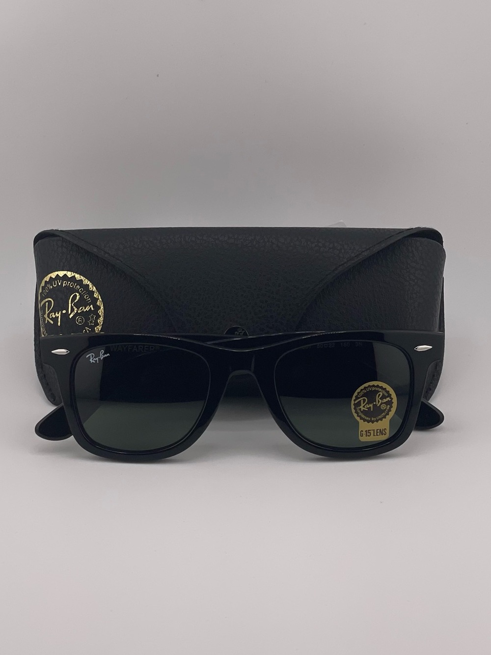 Ray-Ban Black Frame Sunglasses with Dark Green Lenses